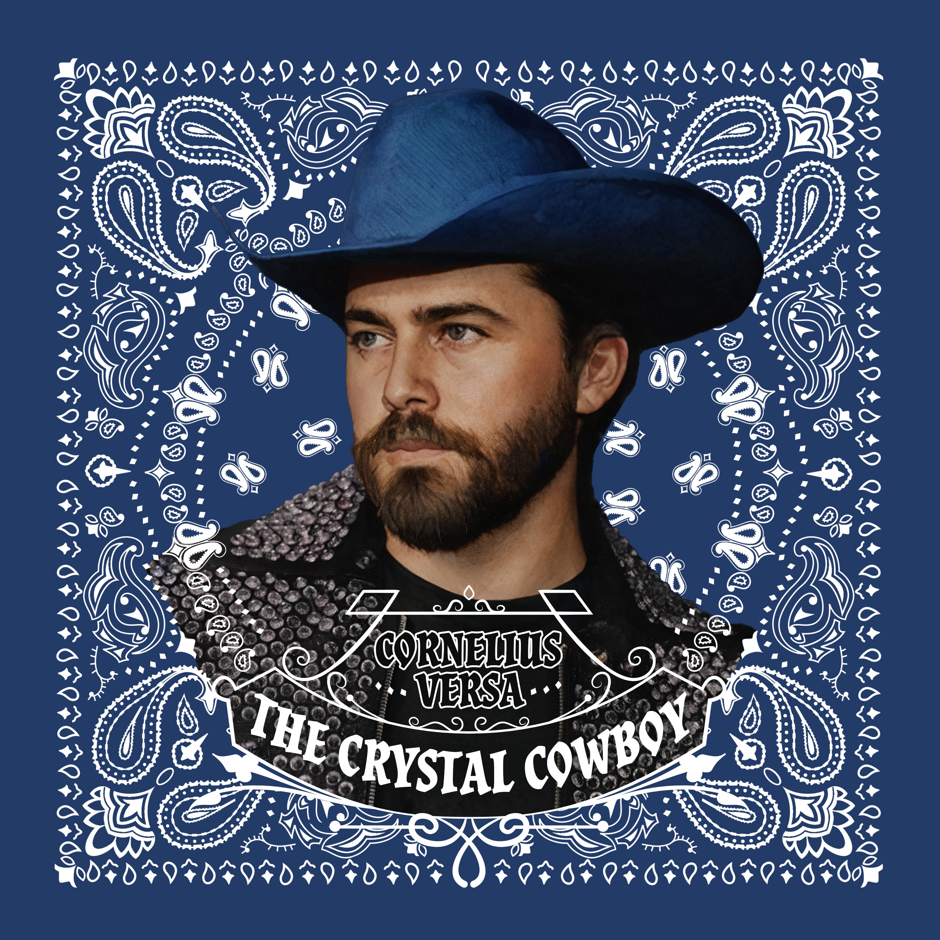 Man wearing a blue cowboy hat with decorative patterns on a blue background, featuring text 'Cornelius Versa The Crystal Cowboy'.