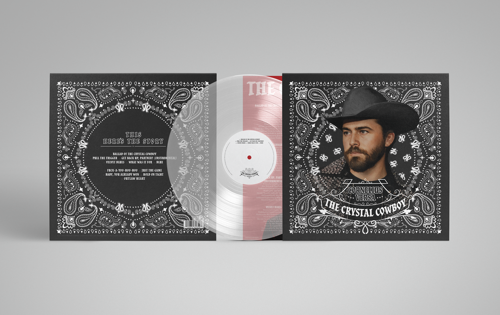 Vinyl record with decorative cover featuring a cowboy illustration on a dark gray background